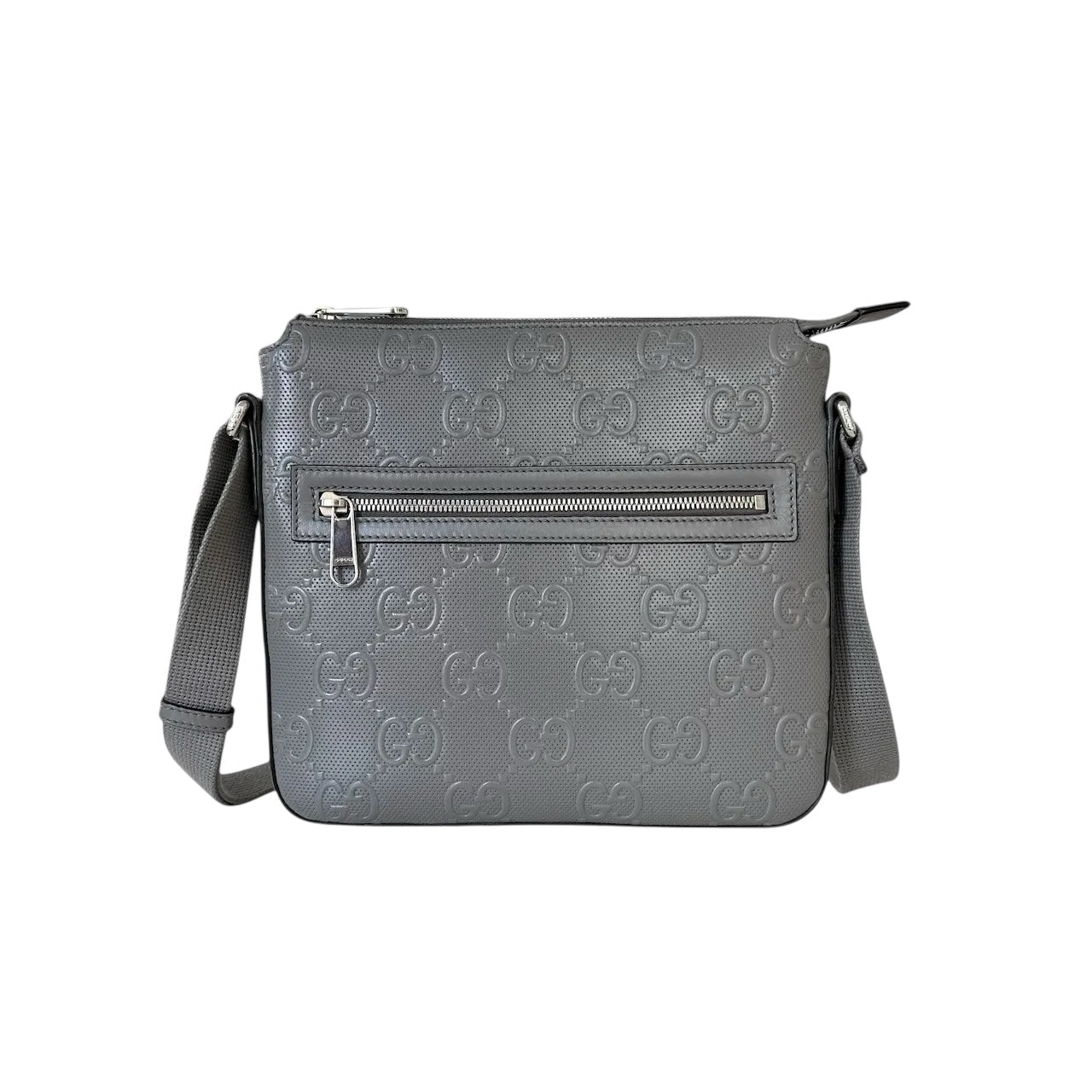 Gucci Messenger in pelle traforata con GG