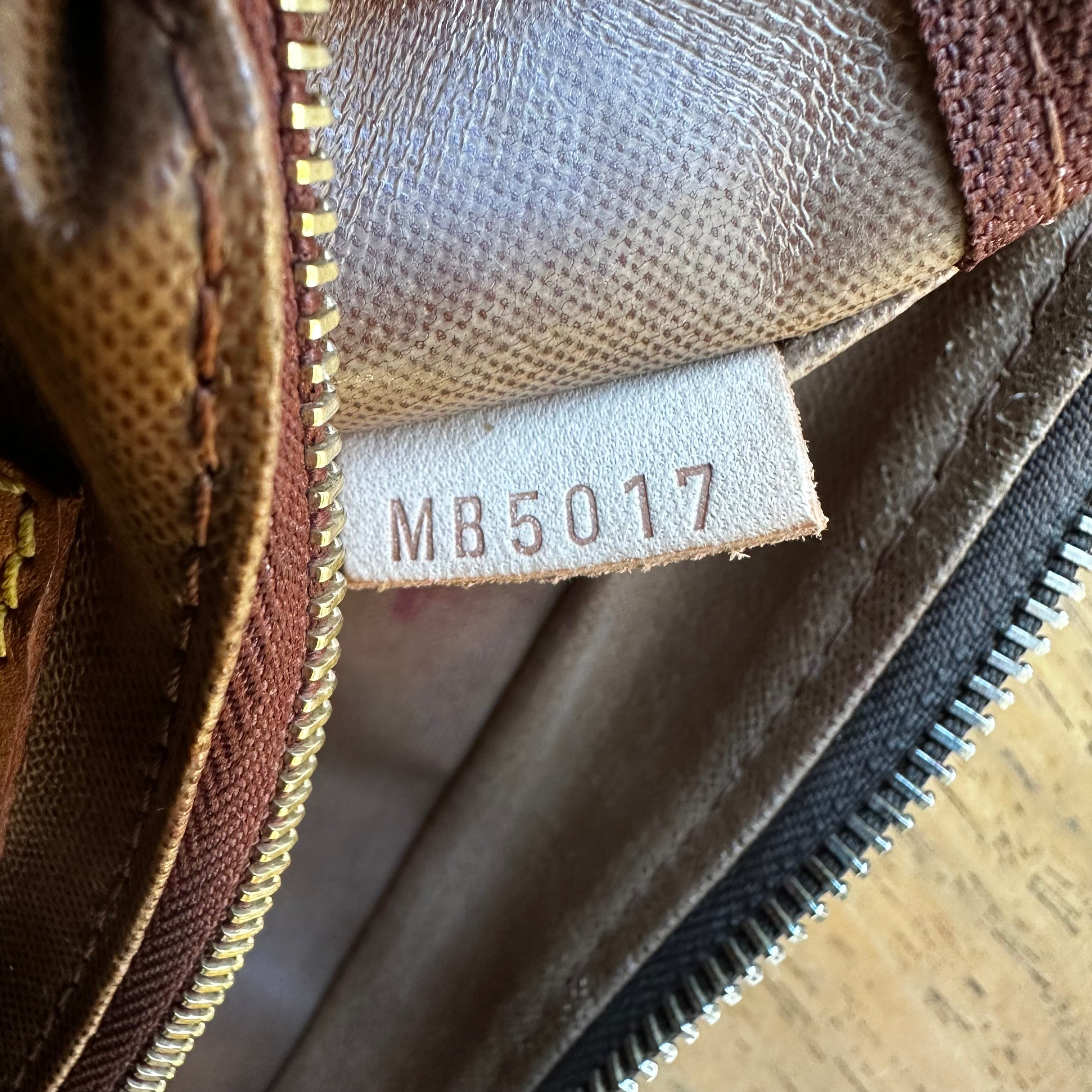 Louis Vuitton Trousse Toilette 25