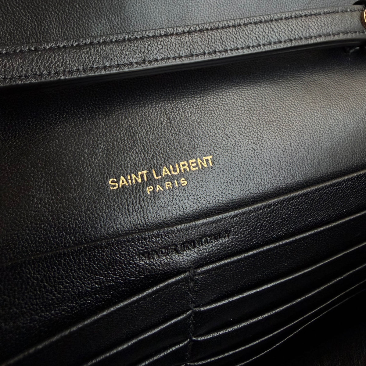Saint Laurent pochette con catena Cassandre
