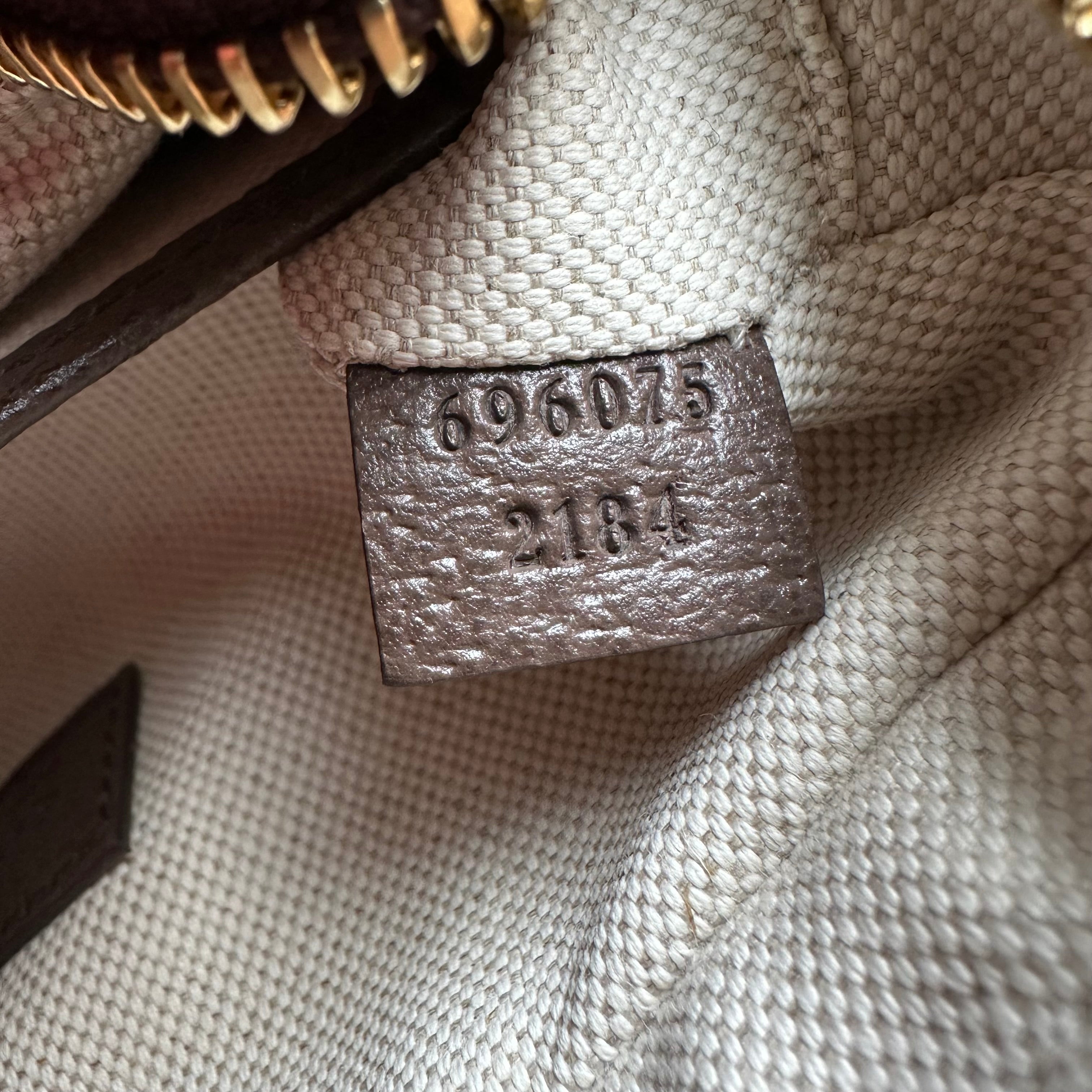 Gucci mini borsa in tela GG Jumbo