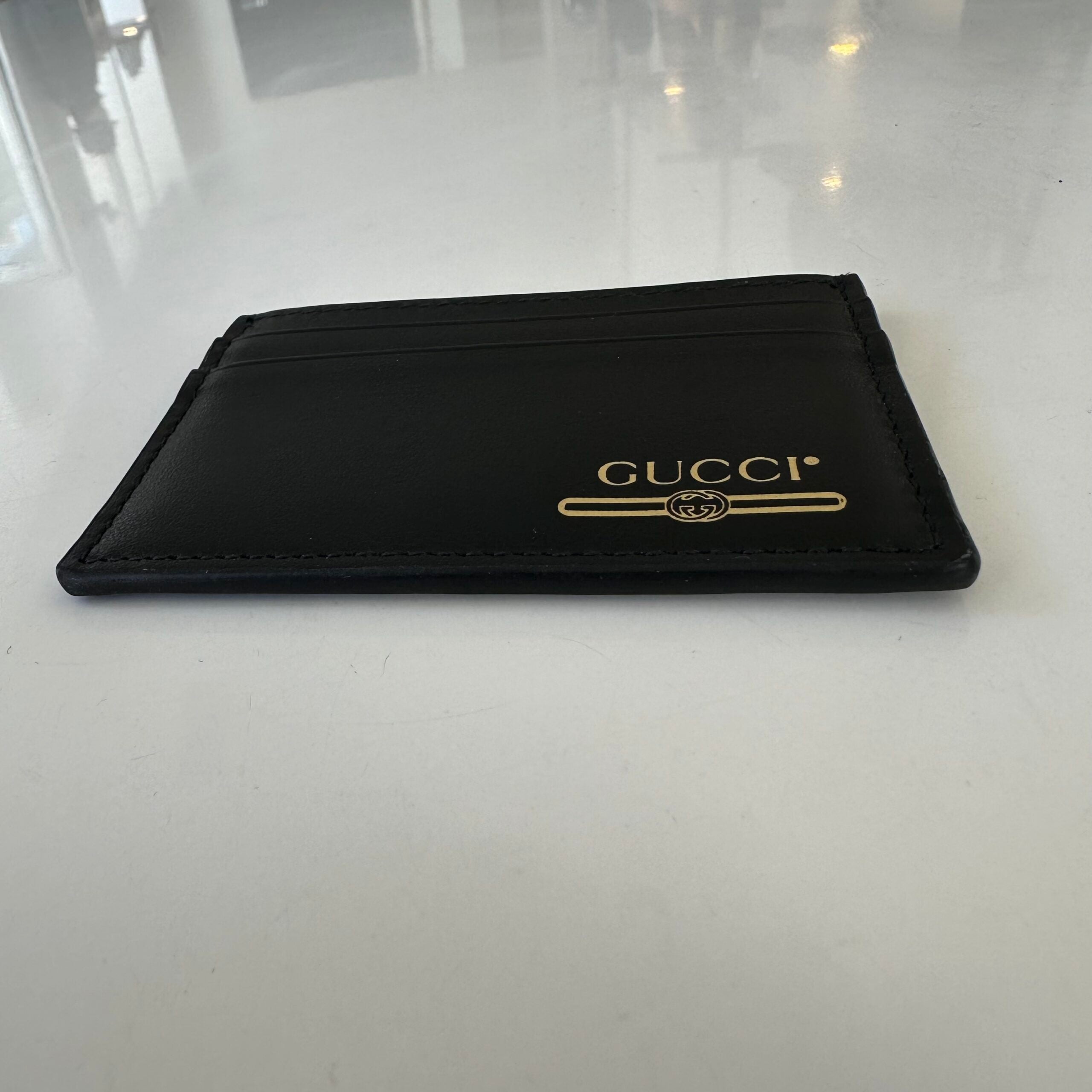 Porta carte Gucci in pelle con logo Stile: 547596