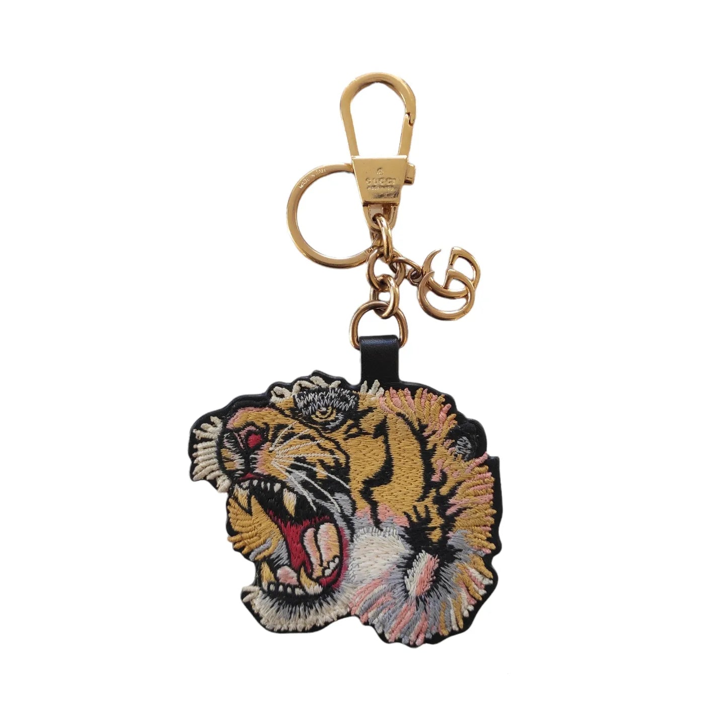 Charm o portachiavi Gucci Tiger in metallo, tela GG supreme e finiture in pelle nera