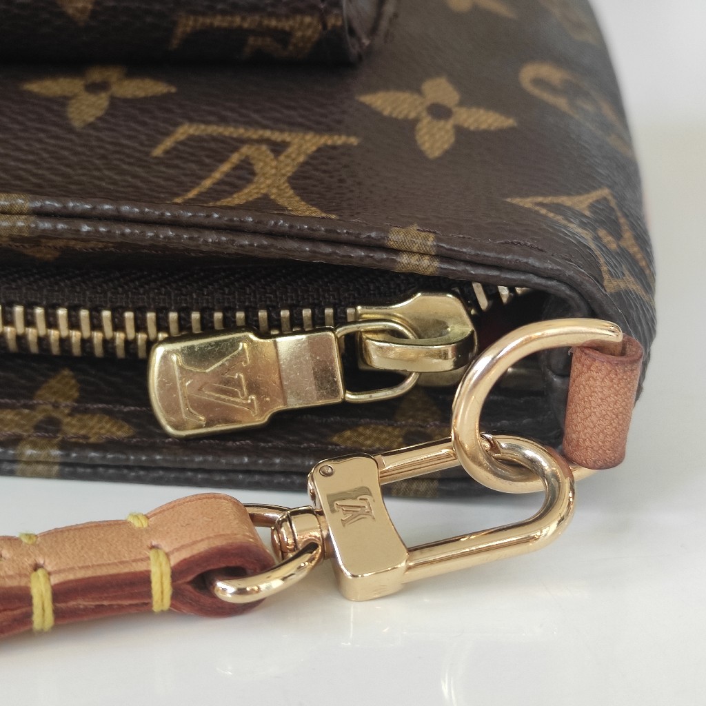 Louis Vuitton Partition Wristlet in tela monogram e finiture in