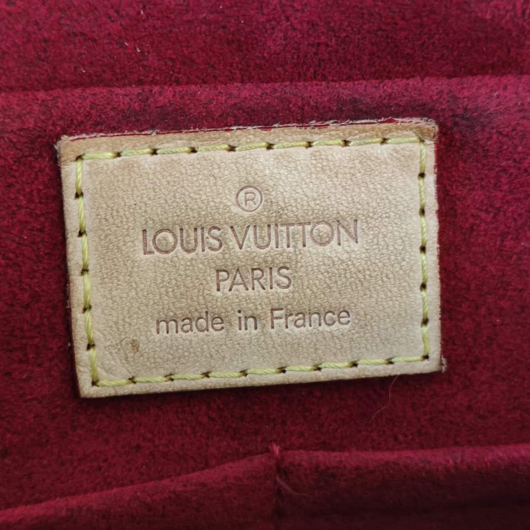 Borsa Louis Vuitton Viva Cité in tela monogram e finiture in