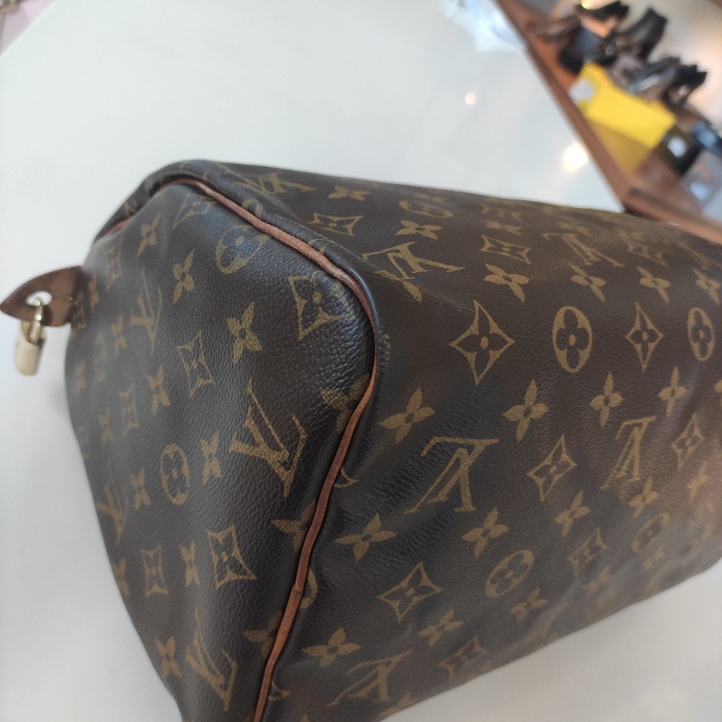 Borsa Louis Vuitton Boulogne 30 in tela monogram e finiture in vacchetta  naturale – Easy Luxury – Borse usate di Lusso