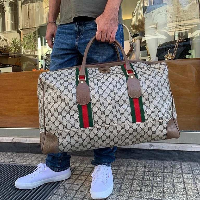 Borsa viaggio Gucci vintage in tela GG supreme, nastri web e finiture in  pelle marrone – Easy Luxury – Borse usate di Lusso